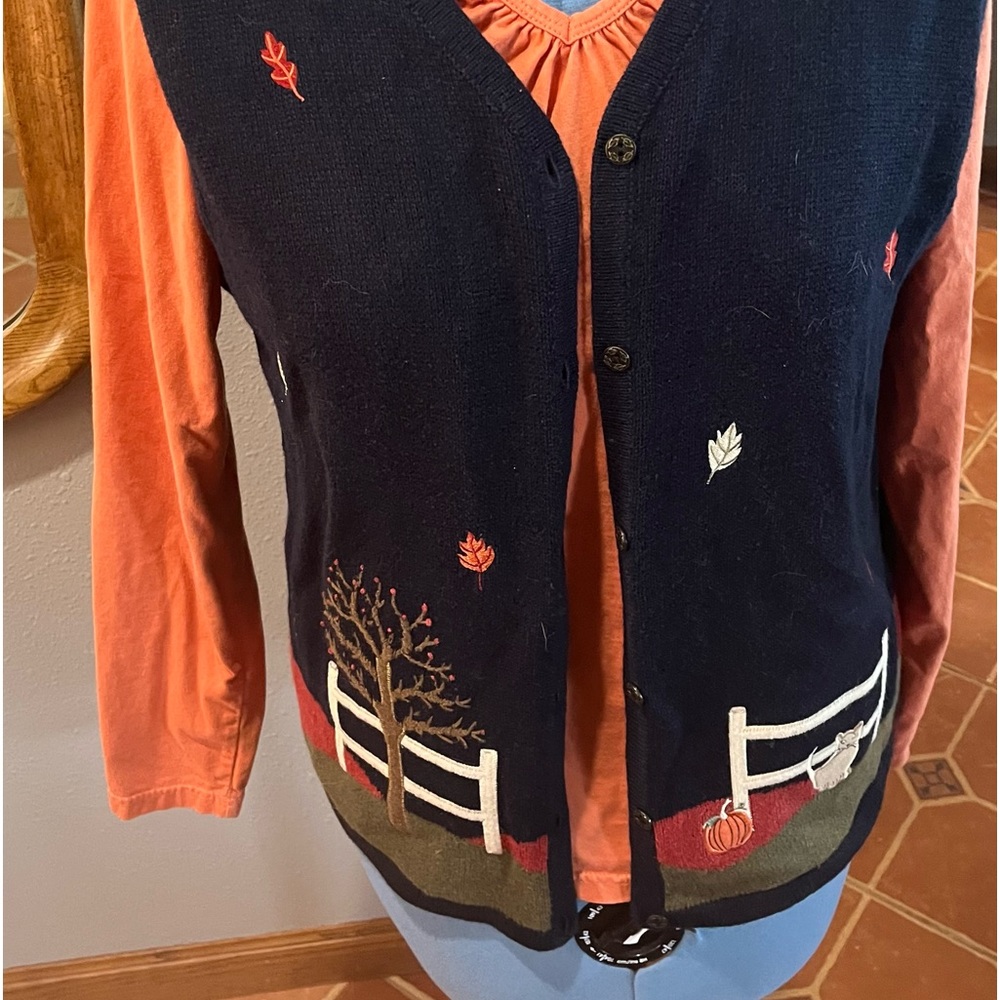 Festive Fall vest with leaves falling. Vest only shirt is separate